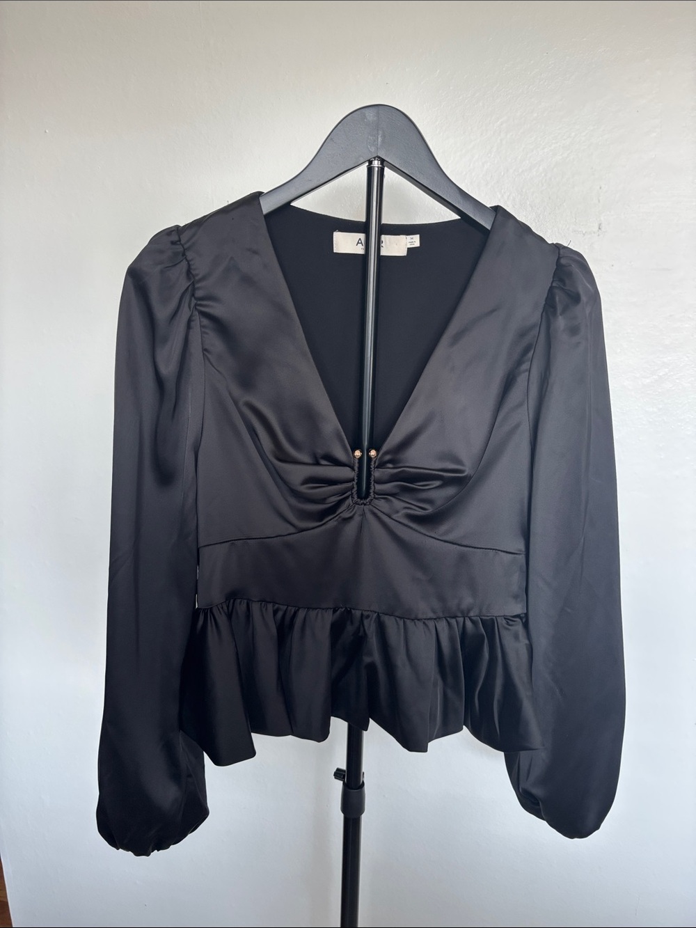Astr Black Satin V-Neck Peplum Blouse with Puff Sleeves